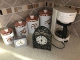 Coffee pot, clocks, and canisters