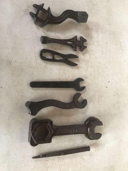 Various antique wrenches and punch