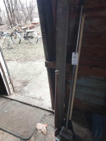 Small rake, scraper, baseball bat, and 4" x 4" wood post.