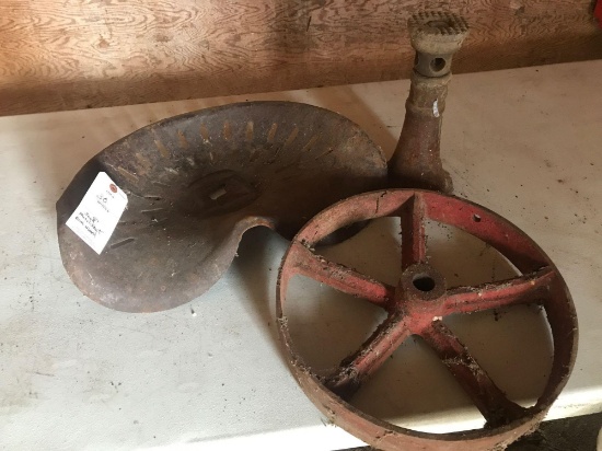 Duff screw jack, a belt driven wood pulley, steel tractor seat