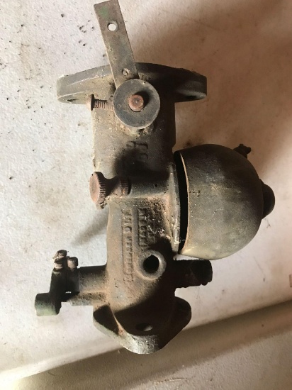 Carburetor for an unstyled 2-cylinder John Deere tractor.