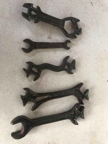 5 - antique wrenches advertised Emerson, Deering and Moline Drill