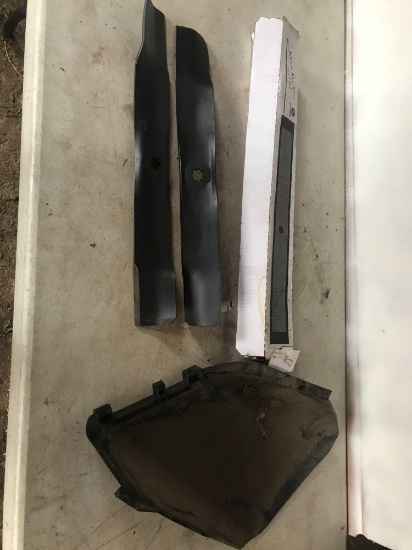 John Deere mower guard and 2 new 21" blades for a 42" deck mower.