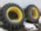 Pair of 18.4x38 clamp on duals with clamps. 1 rim has slight damage and small cut in rubber on side