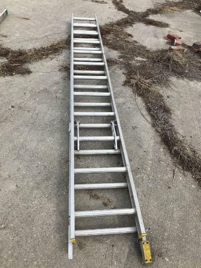 24' Werner aluminum extension ladder. One side has slight crack.
