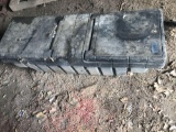 Black plastic pick-up tool box.