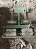 Light bracket for John Deere tractor.