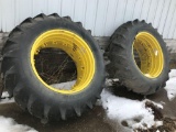 Pair of 18.4x38 clamp on duals with clamps. 1 rim has slight damage and small cut in rubber on side