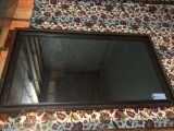 Framed wall mirror. 26