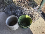 Miscellaneous hanging flower pots and 2-gallon Western Stoneware crock, some cracks.