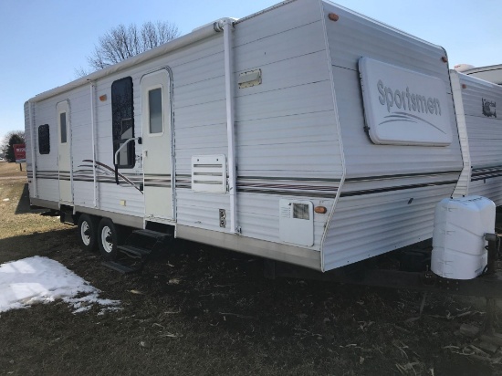 2001-30' Sportsmen pull type tandem axle camper with 2 walk-in doors, 2 slide outs, sleeps 4 with