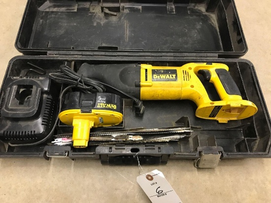 Cordless DeWalt variable speed reciprocating saw. Model DW938 with case, charger, and battery, plus