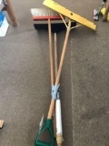 Long-handled plastic snow scoop, a metal snow scoop, and a barn push broom - NO SHIPPING