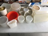 Various Tupperware containers, water pitchers, and much more.