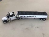 1/64 scale tractor w/Farmers Cooperative Co. Hinton-Oyens- Akron-Le Mars grain trailer w/tarp