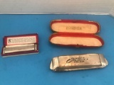 (2) Hohner Harmonicas, Deluxe and Marine Band. With Cases.