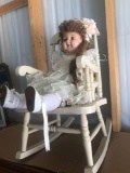 Vintage Doll and Rocking Chair. Bisque Head, Glass Eyes, and Cloth Body. Very Nice
