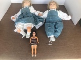 (2) Matching Dolls and a Small Doll