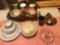 Various Saucer and pottery, McCoy creamer, and glass juicer.