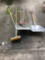 Aluminum and plastic grain scoops, axe, lawn rake, and mop