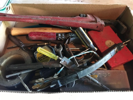 Various hand tools including: 18'' pipe wrench, screwdrivers, tape measures, small socket sets, and