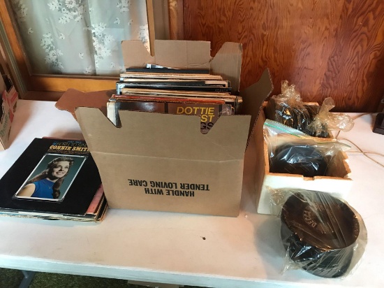 Several 45 and 33 record albums.