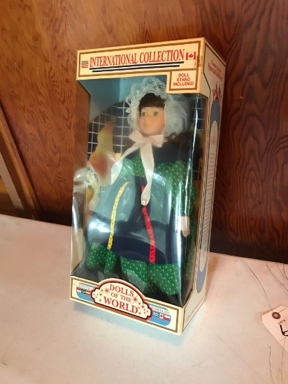 Country: Canada "Doll's of the World" Genuine Porcelain, soft expressions, 17'' doll, NEW IN BOX w/