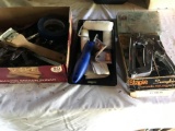 Stapler, Various Painting supplies, Vice grips, Screwdrivers, Misc. Tools.