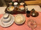 Various Saucer and pottery, McCoy creamer, and glass juicer.