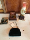 Collectible chain handle purse, silhouette picture/frame, jewelry box, and electric lamp.
