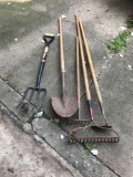 Potato fork, sand shovel, garden hoe, and rake