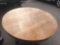 Oak 48'' round table with center pedestal and 4 side legs, and 4 leaves