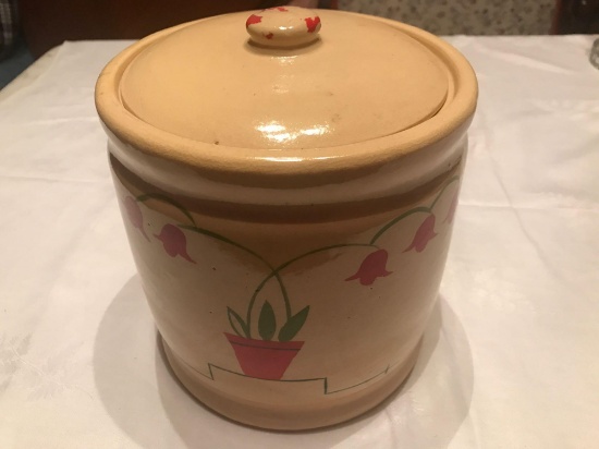 Red Wing cookie jar with tulip design, 7" wide and 7" tall.