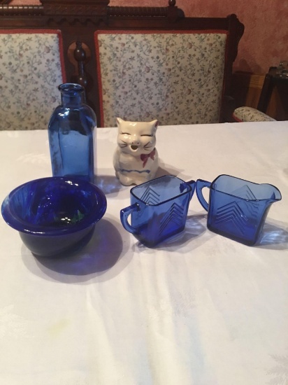 Cobalt blue creamer and sugar, small bowl, flower vase, Puss'n Boots Kitty.