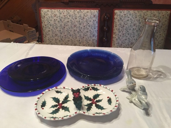 Cobalt blue plates, clear glass milk jug, Christmas tray, two birds.