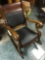 Oak sturdy rocker with claw feet on the front runners, leather seat and back (Excellent condition)