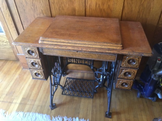 Singer treadle sewing machine in nice ornate cabinet with applied carving, (no belt)