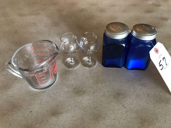 Blue glass large salt and pepper shakers, measuring cup and 2 shot glasses