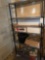 5 shelf metal storage rack , blue granite canner, several quart and pint jars and miscellaneous