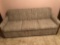 Regular sized hide a bed sofa. Tan color and nice condition. NO SHIPPING