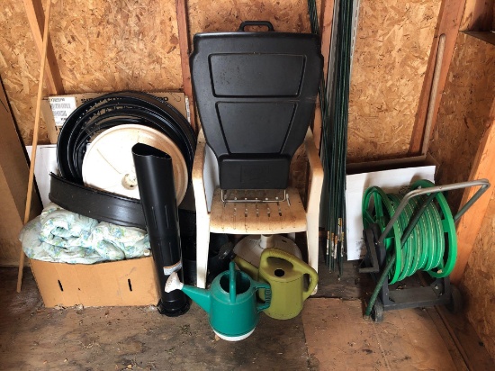 White plastic lawn chair, lawn edging, plastic garden stakes, and garden hose w/ reel. NO SHIPPING!