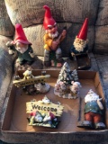 4 gnomes with welcome sign and Christmas Decor. 1 lighted!