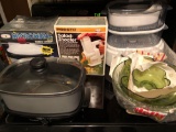 Microwave cooker, Presto salad shooter, Oster stackable electric steam cooker, West Bend warming