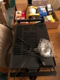 Betty Crocker gourmet electric Grill with cord and box of various lightbulbs