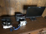 20 inch e-machines flat screen computer monitor, Sony Polaroid camera with case and blood pressure