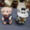 Plastic pig and cow cookie jars