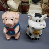 Plastic pig and cow cookie jars