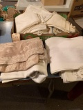 4 rolls of linen tablecloth's, Miscellaneous linen table cloths and napkins, Runners, scarves. No