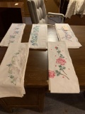 5 pair of new pillow cases, 3 nice tatted table cloths or covers. Shipping