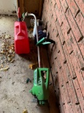 Lawn boy gas weedeater, 5 gallon gas can, funnel, and peak antifreeze, 2 rakes. No shipping